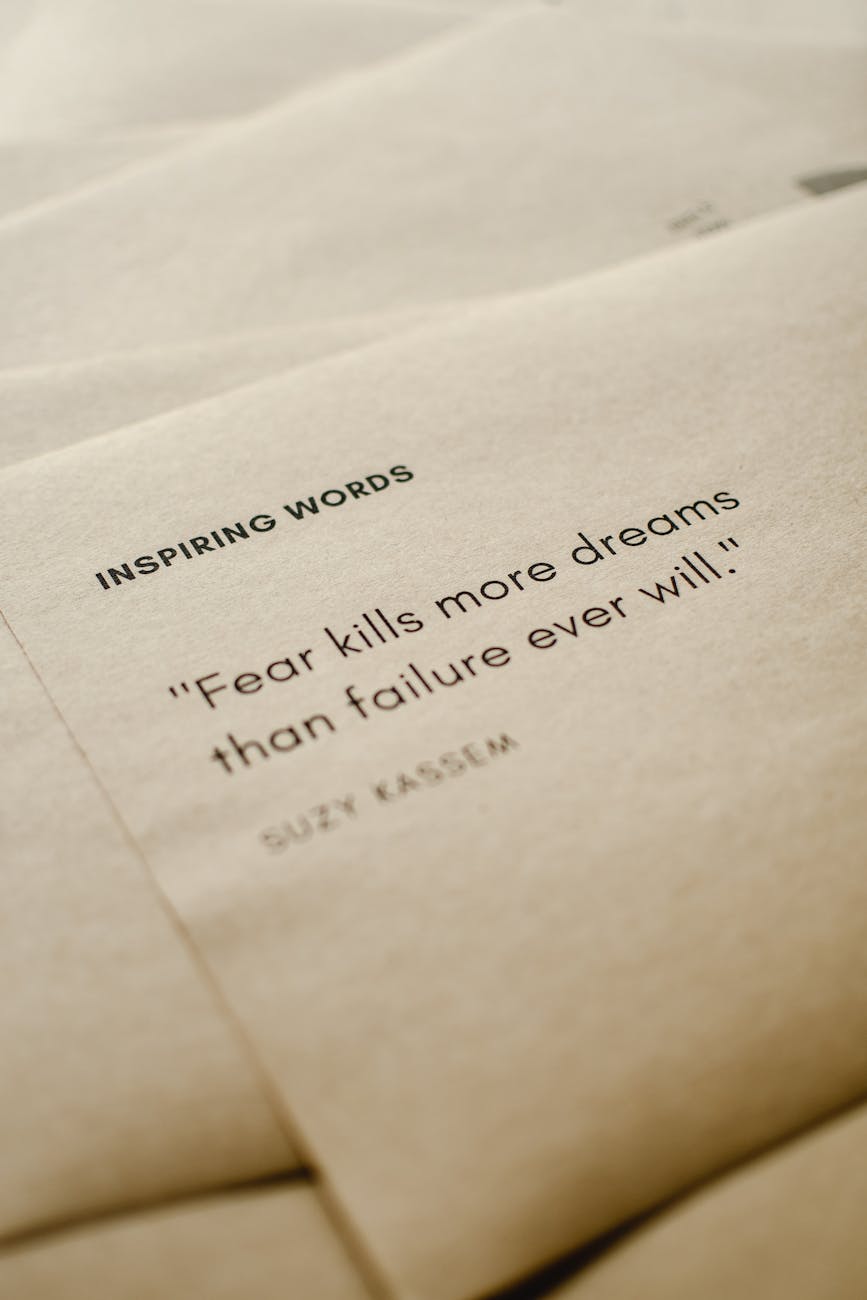 close up shot of inspiring words on a brown paper
